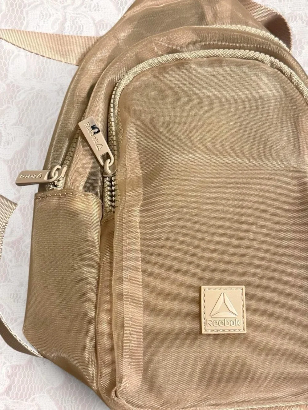 Tan Reebok Mini Sling Backpack
